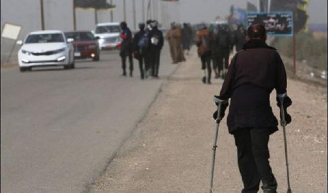 7. Karbala f -shia-pilgrims-on-foot-to-attend-arbaeen-karbala-dec-2013-r.jpg