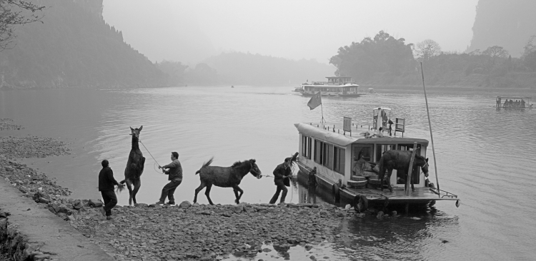 1. Horses and men going in boat.jpg
